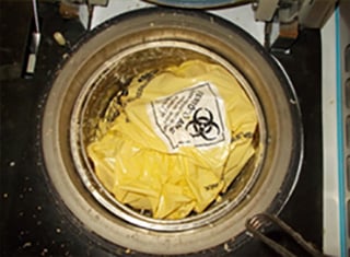 The sterilization chamber is loaded with hazardous dialysis waste